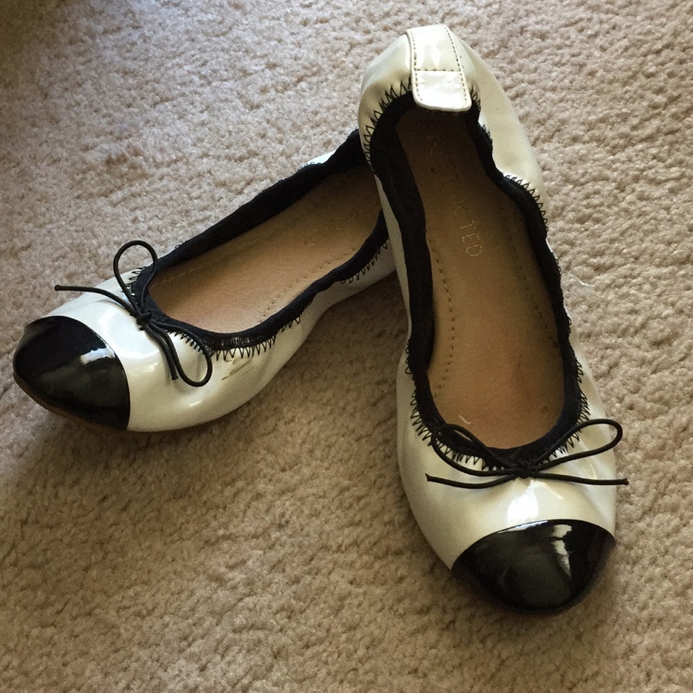 Black and white patent ballerina flats